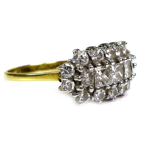 300 - A yellow gold and diamond dress ring, set with a row of five graduating sqaure and rectangular cut s... 