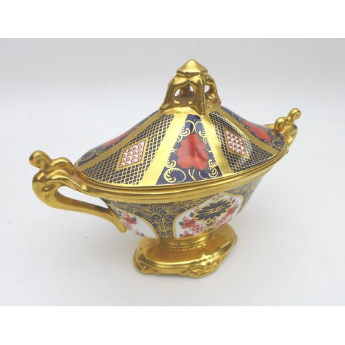 57 - A Royal Crown Derby urn and cover, of boat shape, decorated in the Old Imari palette pattern No. 112... 