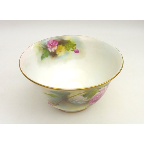 35 - A Royal Worcester bowl, hand painted with pink roses to bowl interior and exterior, signed 'M. Lande... 