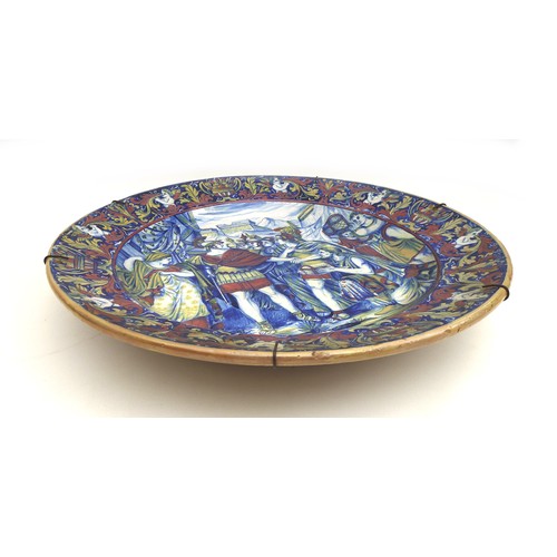 45 - An Italian maiolica charger, circa 1900 in the manner of Rubboli (Gualdo Tadino), decorated in blues... 