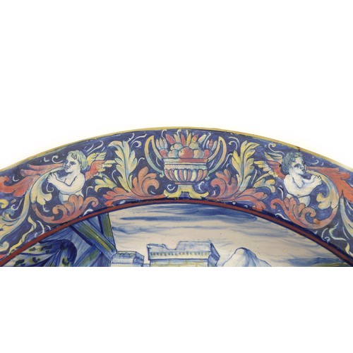 45 - An Italian maiolica charger, circa 1900 in the manner of Rubboli (Gualdo Tadino), decorated in blues... 