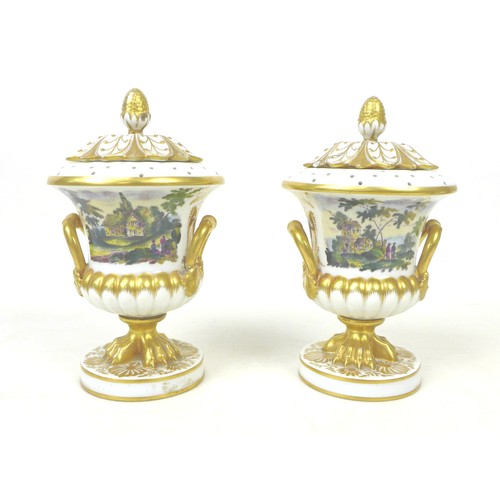 27 - A pair of early 19th century Derby campana urns, with inner linings, covers and twin handles, painte... 