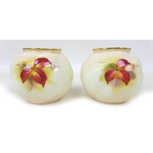 50 - Three pieces of Royal Worcester by Kitty Blake, comprising a pair of globular vases, 7cm high, toget... 