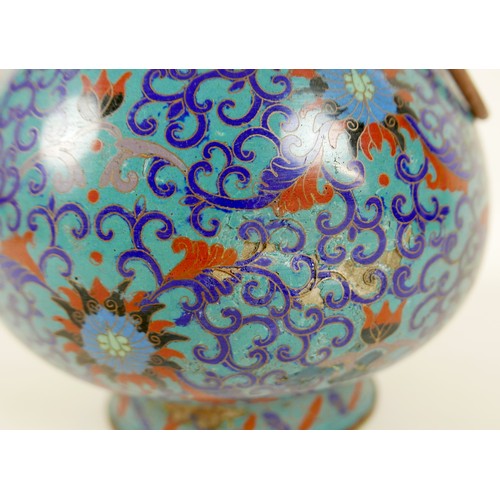 6 - A Chinese cloisonné enamel twin handled vase, Qing Dynasty, mid to late 19th century, of Hu form, de... 