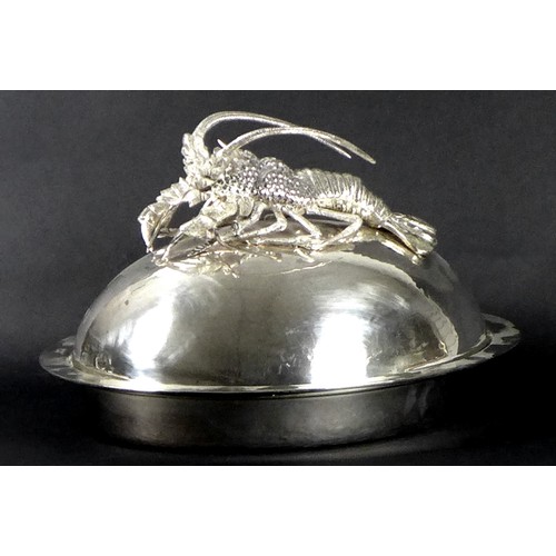 173 - A large late 20th century Franco Lagini silver plated Seafood platter, its domed cover mounted by a ... 