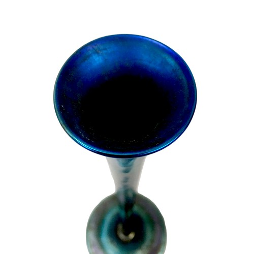 85 - A Tiffany 'Favrile' iridescent blue glass vase,  of slender tapering form with flared rim and steppe... 