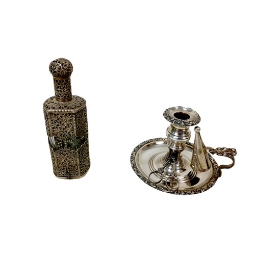 86 - A collection of four silver plate items, comprising a chamber stick with snuffer and wick cutter wit... 