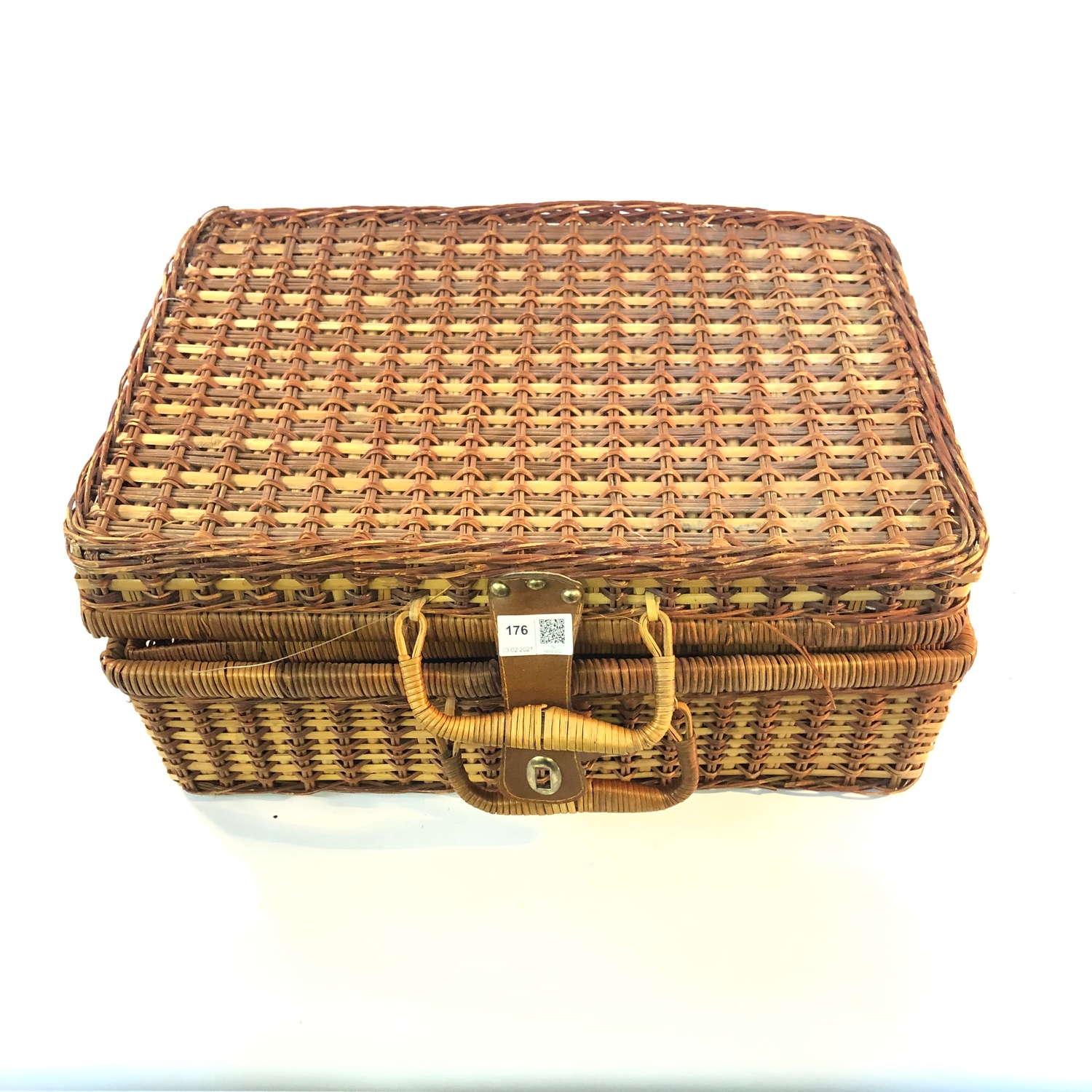 Vintage wicker picnic hamper with some contents