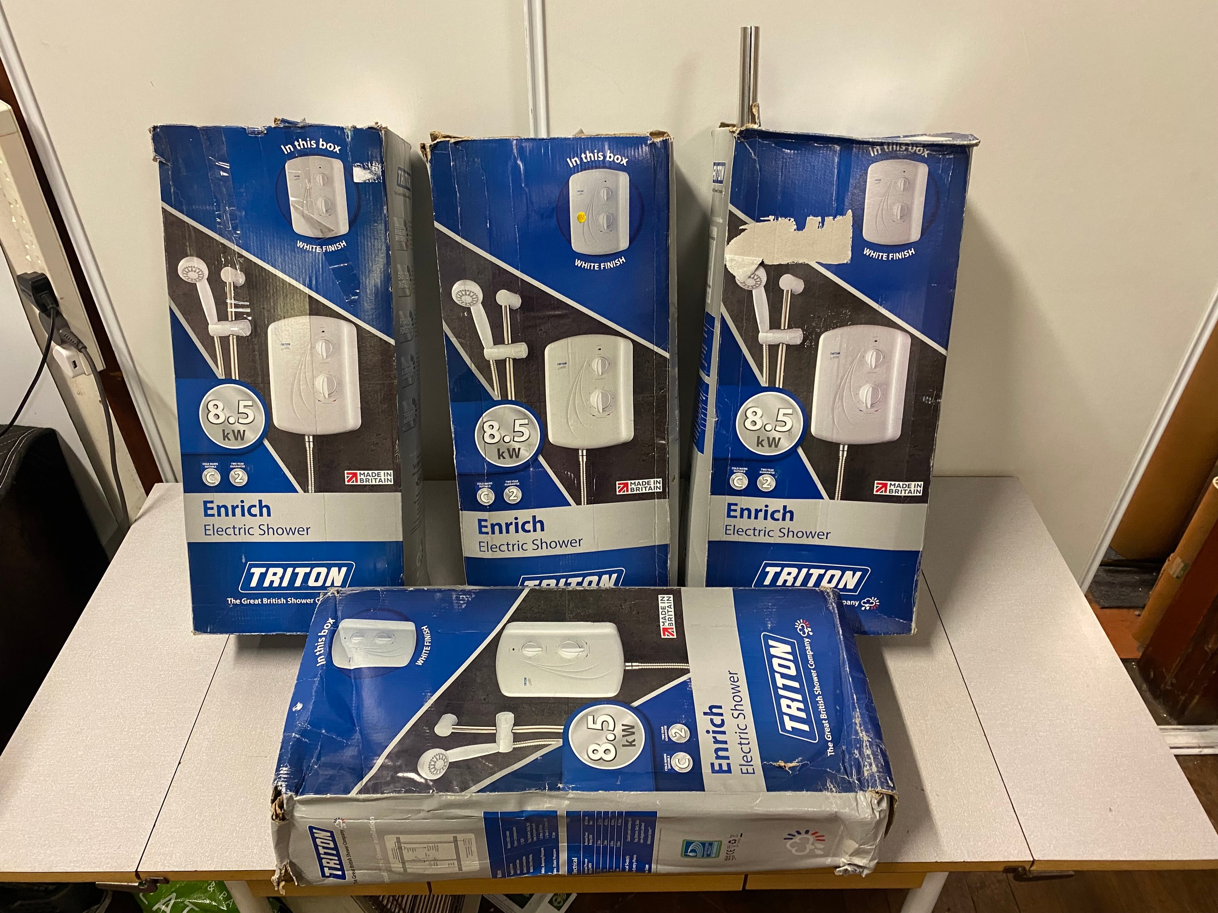 4 Triton Enrich electric showers.