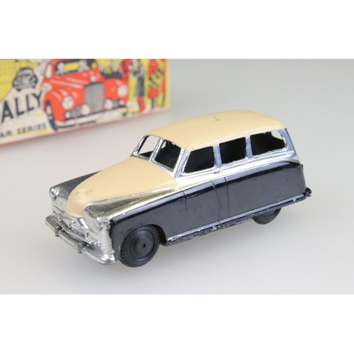 1064 - Boxed The Rally Car Series Standard Estate Wagon diecast model in black/silver/cream, a few marks an... 