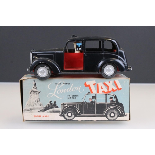 173 - Boxed Fairylite plastic scale model London Taxi with friction motor, gd with some play wear, box tat... 