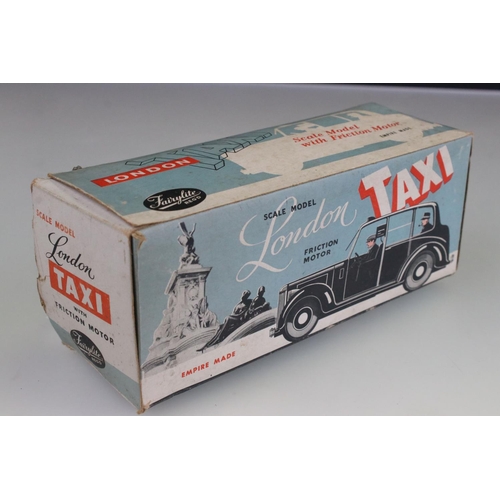 173 - Boxed Fairylite plastic scale model London Taxi with friction motor, gd with some play wear, box tat... 