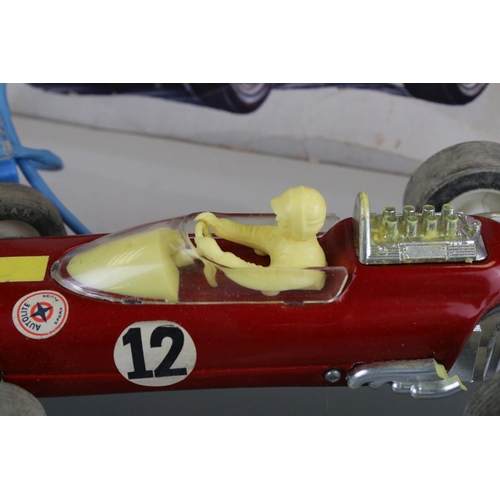 179 - Boxed Bandai Japan R/C 7-7579 Battery Operated tin plate racing car with driver, in red, race number... 