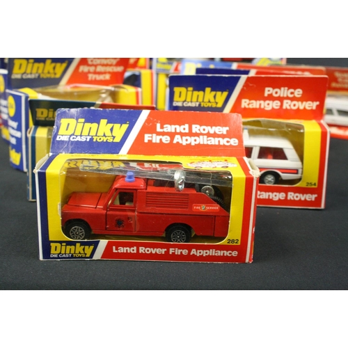 1108 - 13 Boxed Dinky Toys vintage diecast model cars and other vehicles to include 244 Plymouth Police Car... 