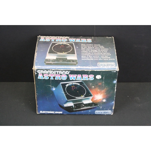 440 - Three boxed electronic games to include Grandstand Astro Wars, Grandstand Model 4600 Video Sports Ce... 
