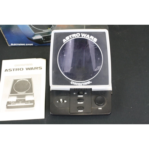 440 - Three boxed electronic games to include Grandstand Astro Wars, Grandstand Model 4600 Video Sports Ce... 