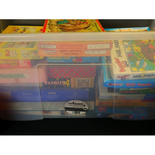 310 - Quantity of boxed jigsaw puzzles to include GWR, Mr Men, Hannah Montana etc plus a group of Star War... 