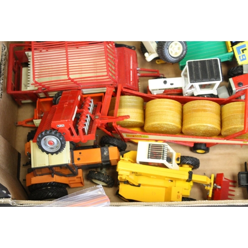 328 - Collection of Britains farming models and figures to include over 30 vehicles featuring Combine Harv... 