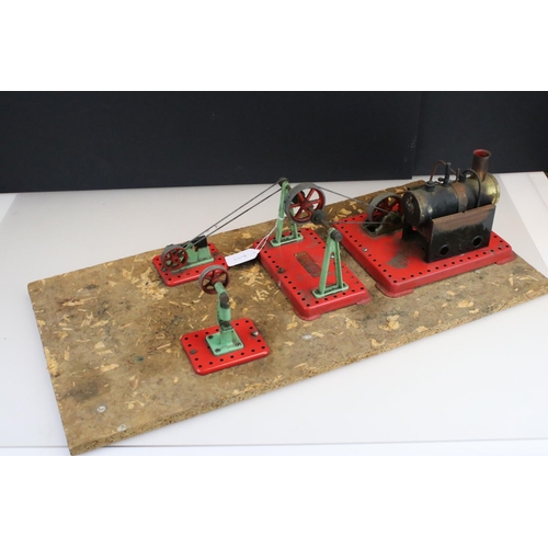 152 - Mamod Stationary Steam Plant on chip board base containing 4 x Mamod models and accessories, rusting... 