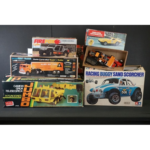286A - Five boxed R/C vehicles to include Einco Nikkos Heavy Trucker (complete with r/c), Latrax Alpha RCX ... 