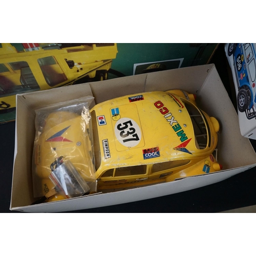 286A - Five boxed R/C vehicles to include Einco Nikkos Heavy Trucker (complete with r/c), Latrax Alpha RCX ... 