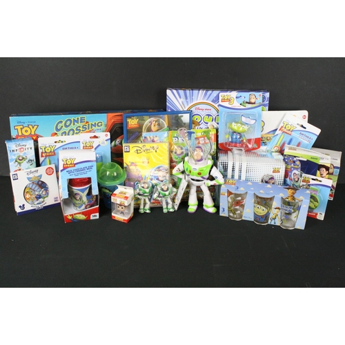 303 - Collection of Toy Story toys featuring 2 x carded Pez Dispensers, carded Magic Scribbler, carded Ali... 