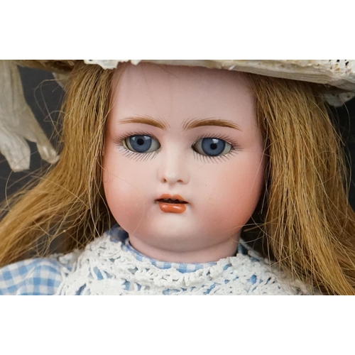 169 - Two early 20th C dolls to include Simon & Halbig bisque headed doll marked K R with star to back of ... 