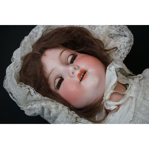 173 - Two Armand Marseille bisque headed dolls to include sleeping brown eyes, teeth, loose wig, gd overal... 