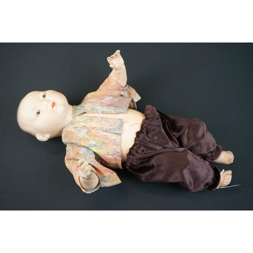 175 - Armand Marseille Oriental baby doll marked 353/3 1/2 K to back of neck, grubby limbs, gd fingers, so... 