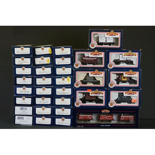 53 - 32 Boxed Bachmann OO gauge items of rolling stock to include wagons & vans featuring Blue Riband 370... 