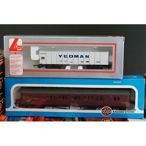 58 - 27 Boxed OO gauge items of rolling stock to include 9 x Lima, 7 x Oxford, 5 x Palitoy Mainline, 4 x ... 