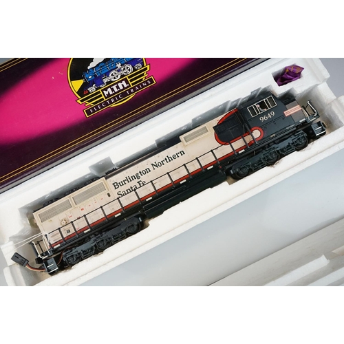 79 - Four boxed MTH Electric Trains O gauge locomotives  to include 20-2221-1 EMD SDL70MAC Diesel BNSF Ca... 