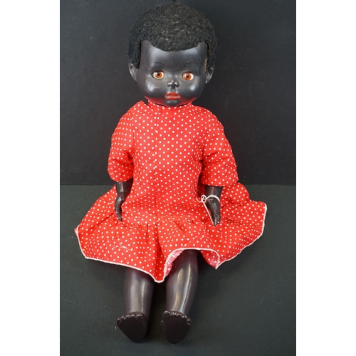 184 - Two mid 20th C Pedigree hard plastic dolls with jointed limbs to include a 1950s black doll with sle... 