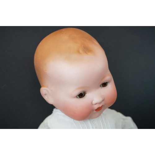 187 - Early 20th C Armand Marseille baby doll, bisque head, bottom teeth, sleeping glass eyes, original dr... 