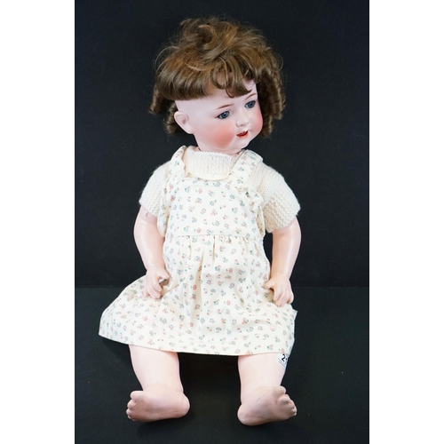 211 - Early 20th C Heubach Koppelsdorf bisque headed doll with blue glass eyes, teeth, wig loose from head... 