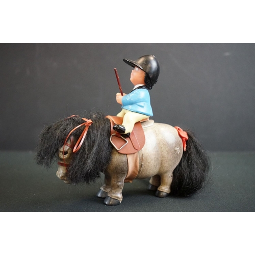223 - Three Plastech Thelwell horses with rider figures, all variants in a good overall condition along wi... 