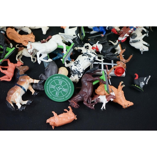 276 - Around 60 Britains plastic figures, together with a group of Britains fences & other plastic figures