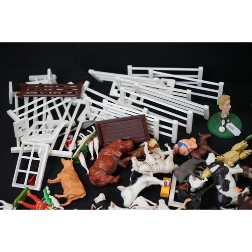 276 - Around 60 Britains plastic figures, together with a group of Britains fences & other plastic figures