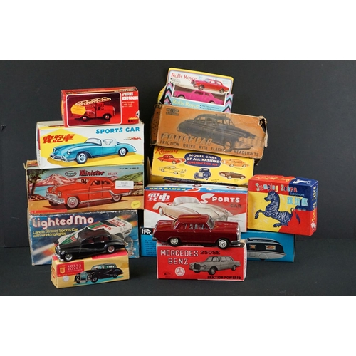 277 - 12 Boxed plastic and metal models to include Minister Deluxe in black, Friction Drive Rolls Royce Si... 