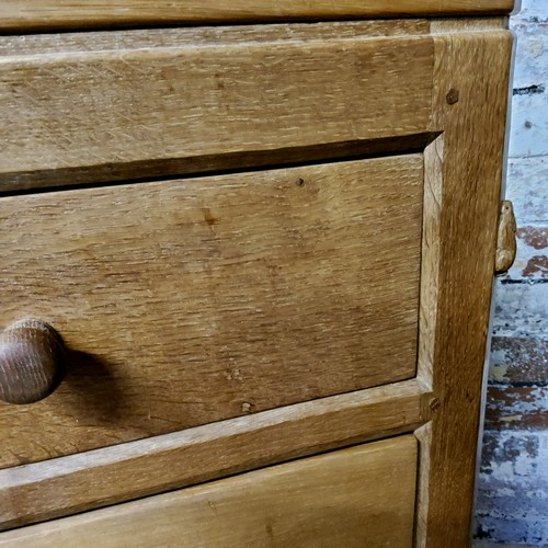 162 - Rabbitman: Peter Heap (Wetwang): A English golden oak dressing chest, two short drawers above two lo... 