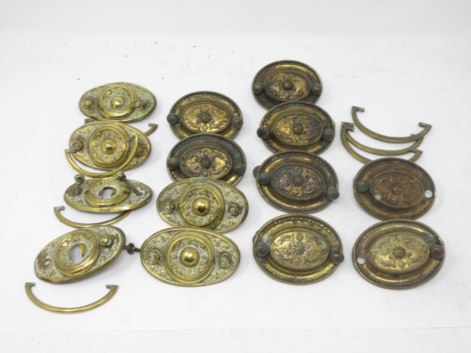 A box of antique and reproduction brass furniture Handles including