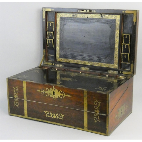 81 - A Georgian Military rosewood and brass inlaid  writing box, c.1830, the hinged lid with Thompson pat... 