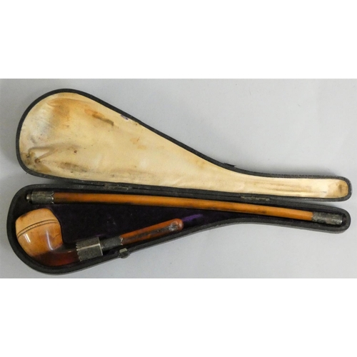 233 - A Victorian meerschaum pipe, the plain bowl with silver mounts and two lengths of pipe, overall leng... 