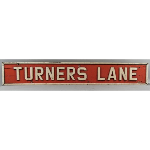 309 - A red painted wooden Signal Box Board, with white painted metal letters, Turners Lane, 26 x 168 cm.
... 