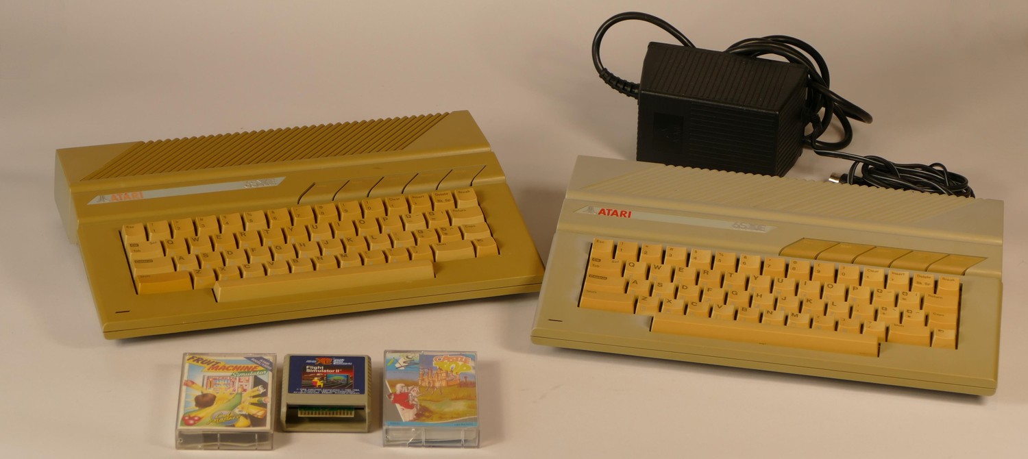 Two Atari 800XL games consoles, together with two Atari 65XE games ...