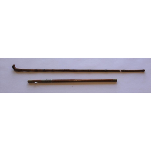 53 - An Edwardian bamboo sword stick, 90 cm and a short sword stick with brass fittings, 60 cm (2).