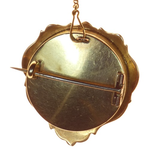 65 - Carlo & Arthur Giuliano, an unusual gold, enamel, garnet and paste brooch, c.1895-1914, the typical ... 