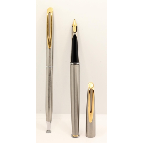 18 - A Waterman fountain pen and propelling pencil set, 18k gold nib, case