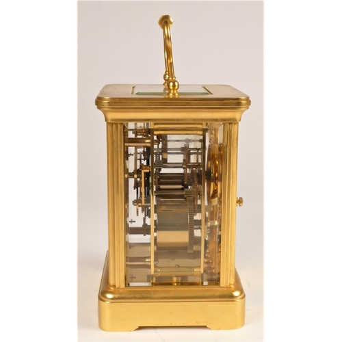307 - Mappin & Webb, London, a brass 1/2 hour striking carriage clock, the white enamel dial with Roman nu... 
