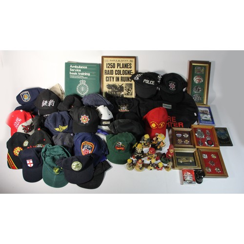 45 - A large collection of fire service related caps & ties, together with cased emergency services badge... 